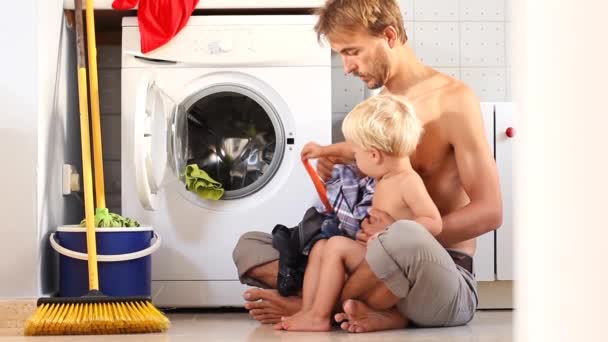 Male Housewife Family Teamwork Concept Cute Toddler Son Helps His — Stock Video