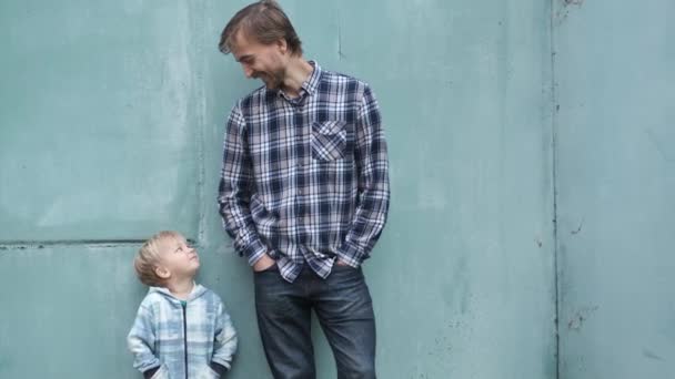 Fathers Day Lifestyle Father Son Standing Together Blue Wall Looking — Stock Video