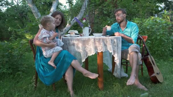 Idyllic Family Father Mother Little Child Sitting Garden Table Backyard — Stock Video