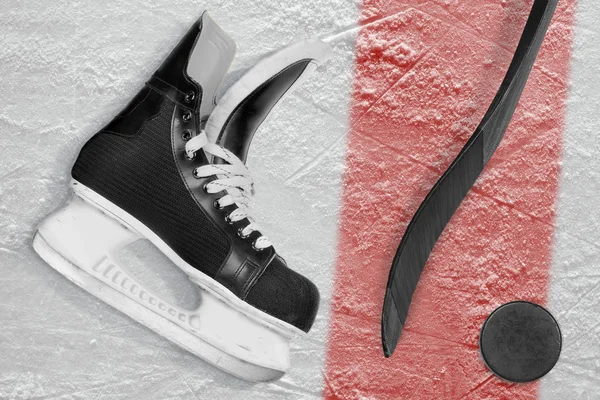 Hockey skates, putter and washer on ice. Concept, hockey, background