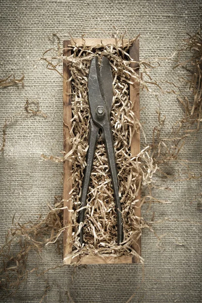 Scissors for cutting metal in a wooden box — Stock Photo, Image