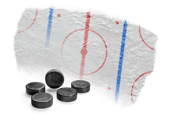 Hockey pucks and fragment of the hockey arena with markings — Stock Photo, Image