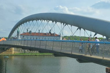 Krakow, Poland - April 22, 2025:  View of the Father Bernatek Footbridge, Kladka Ojca Bernatka