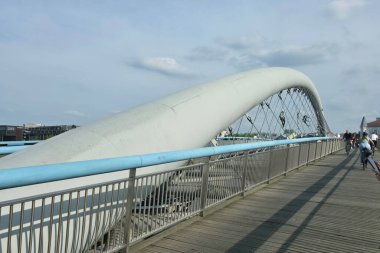 Krakow, Poland - April 22, 2025:  View of the Father Bernatek Footbridge, Kladka Ojca Bernatka