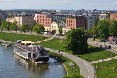 Krakow, Poland - April 23, 2025: View of the Vistula riverbank with a ship