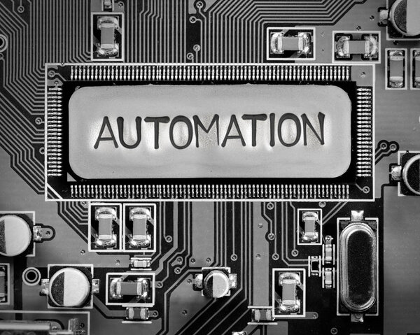 Macro photo of circuit board with AUTOMATION imprinted on the chip surface