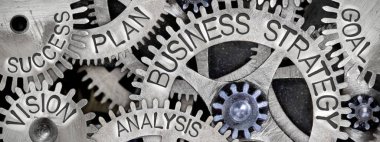 Metal yüzeye baskılı kelime makro fotoğraf diş tekerlek mekanizması iş stratejisi kavramı ile ilgili