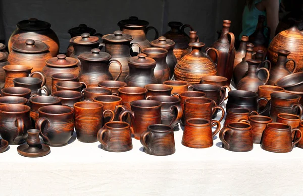 Clay jugs on the counter — Stock Photo, Image