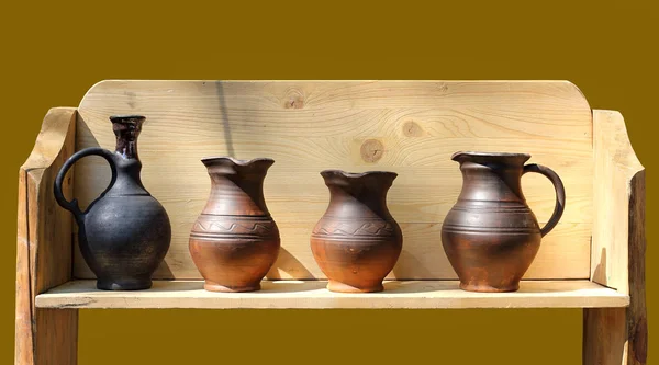 Old time clay jugs on the counter — Stock Photo, Image