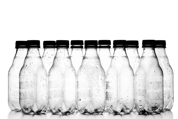 Plastic bottles with condensation droplets — Stock Photo, Image