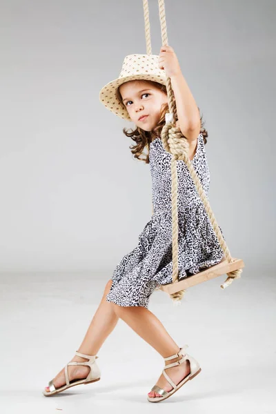 Happy Little Girl Swinging Wooden Swing — Stock Photo, Image