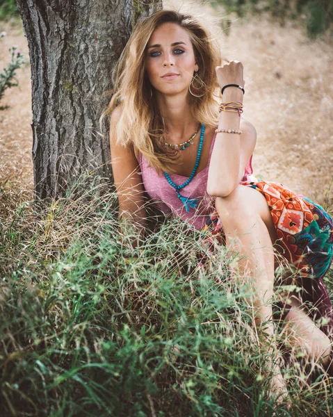 Gypsy woman outdoor. Beautiful young woman.