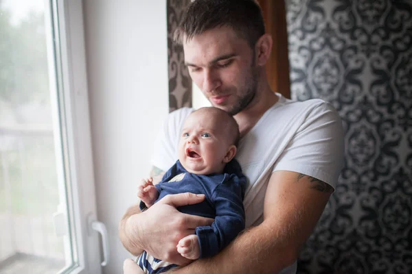 Father holding his little baby — Stock Photo, Image