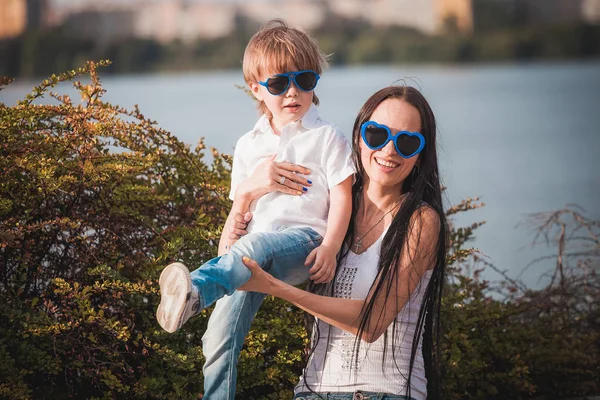 Happy mother with son outdoor — Stock Photo, Image