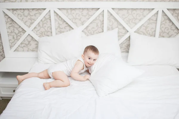 Cute baby boy in bed — Stock Photo, Image