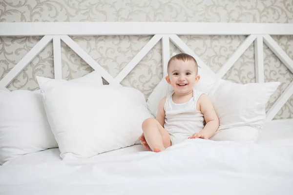 Cute baby boy in bed — Stock Photo, Image