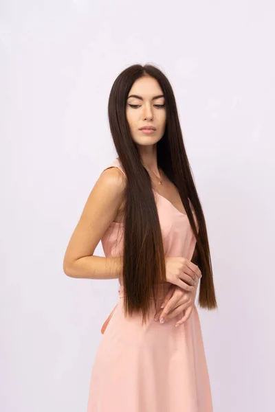Young woman with long hair. Brunette — Stock Photo, Image