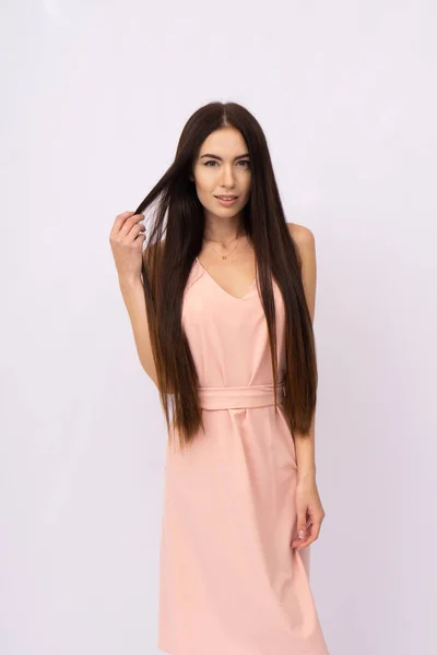 Young woman with long hair. Brunette — Stock Photo, Image