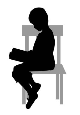 Çocuk bir kitap okuyor..