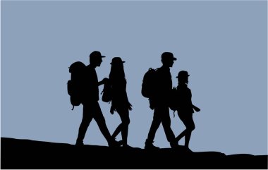 Yürüyen insanların siluetleri.
