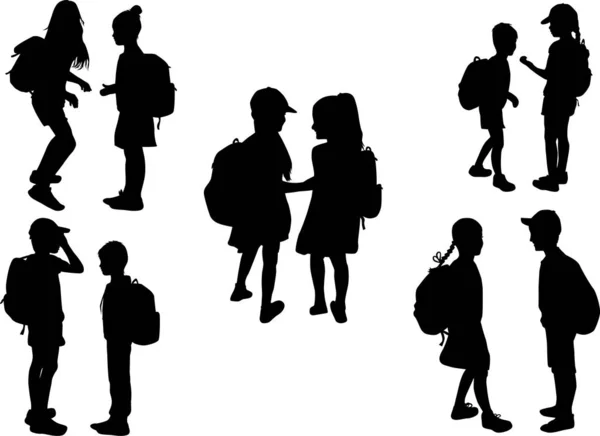 Silhouettes of a children with a backpack . — Stock Vector