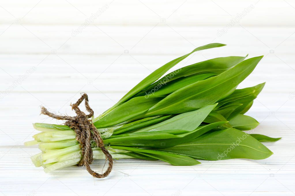 Ramson or wild garlic on white  kitchen table