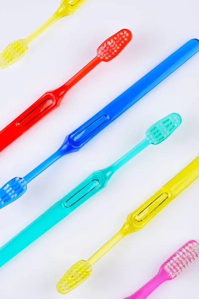 Colorful Toothbrushes White Flat Lay Arrangement Angle — Stock Photo, Image