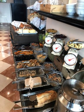 TIBERIAS, ISRAEL - MAY 14, 2018: Scots Hotel Breakfast Buffet. A spread of various foods at the hotel once the site of a 19th-century Scottish hospital. clipart