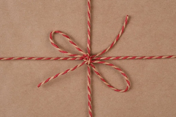 Closeup Eco Friendly Recyclable Plain Paper Twine Wrapped Christmas Present — Stock Photo, Image