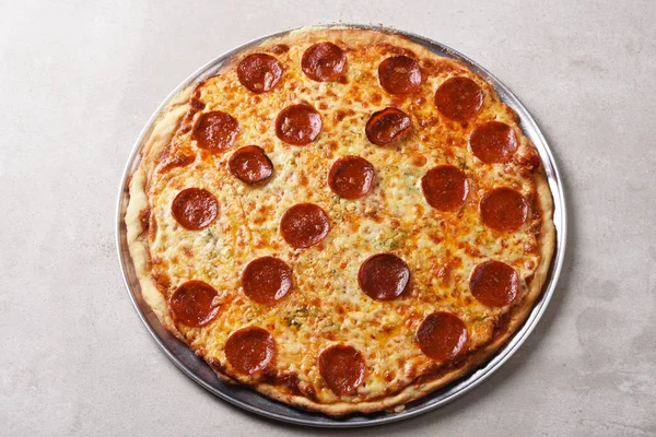 A fresh homemade three cheese pepperoni pizza — Stock Photo, Image