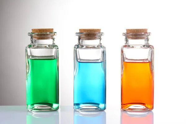 Trois Bouteilles Liquide Couleur Différente Huiles Essentielles Dans Des Flacons — Photo