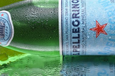 IRVINE, CALIFORNIA - MARCH 10,  2018: San Pellegrino Mineral Water closeup.  The sparkling water is produced in San Pellegrino Terme, in the Province of Bergamo, Lombardy, Italy. clipart