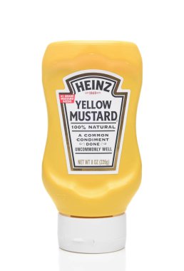 IRVINE, CALIFORNIA - OCT 27, 2018: A squeeze bottle of Heinz Yellow Mustard.  clipart