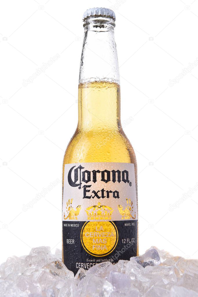 IRVINE, CALIFORNIA - MARCH 12, 2018: A bottle of Corona Extra Beer in ice. Corona is the most popular imported beer in the USA.
