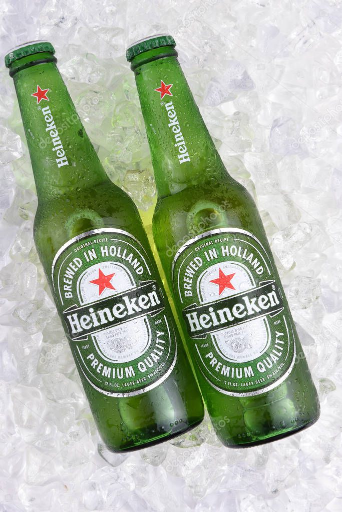 IRVINE, CA - MAY 29, 2017: Heineken Beer bottles on ice. Since 1975, most Heineken beer has been brewed at the brewery in Zoeterwoude, Netherlands.