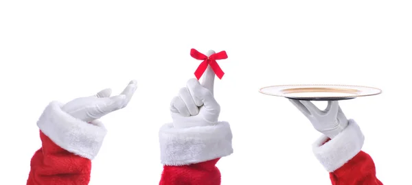 三个圣诞老人的手指向向上与红色丝带绑在食指 拿着托盘 和手掌向上的特写镜头 — 图库照片