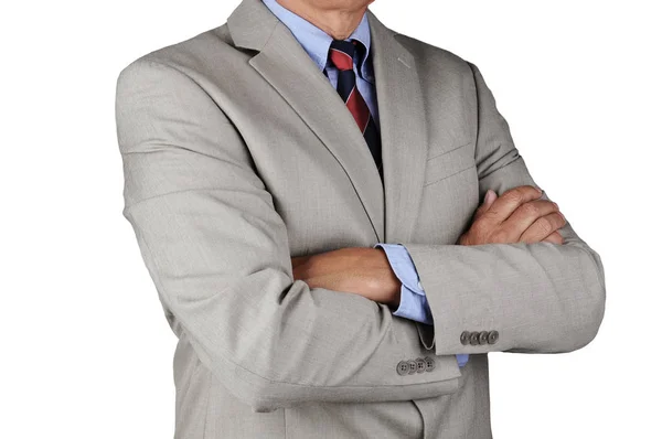Primo piano di un uomo d'affari che indossa un vestito grigio chiaro in piedi con — Foto Stock