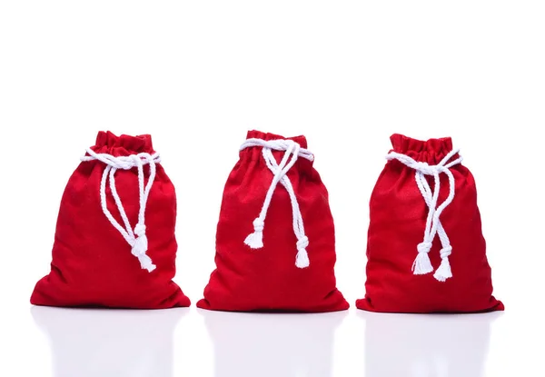 Tres Rojo Santa Claus Juguete Bolsas Blanco Las Bolsas Están — Foto de Stock