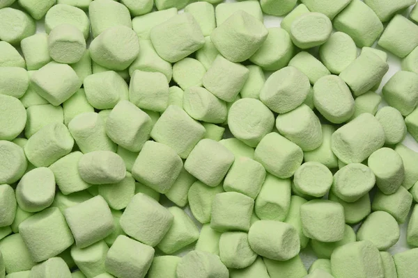 Groene mini marshmallows vullen het frame — Stockfoto