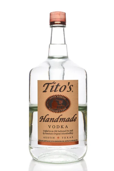 A 1.75 liter bottle of Titos Handmade Vodka, crafted in an Old F — Stock Photo, Image