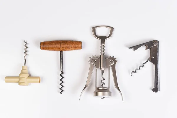 Assorted corkscrews on white — Stock Photo, Image