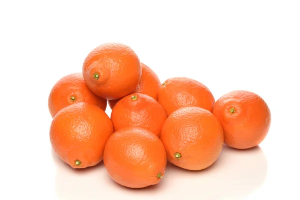 A pile of fresh picked Minneola Tangelos on white — Stock Photo, Image