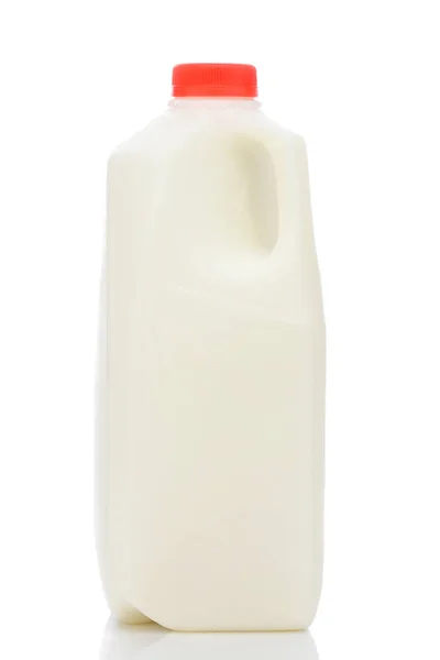 A one quart plastic bottle of milk, with red cap and no label — Stock Photo, Image