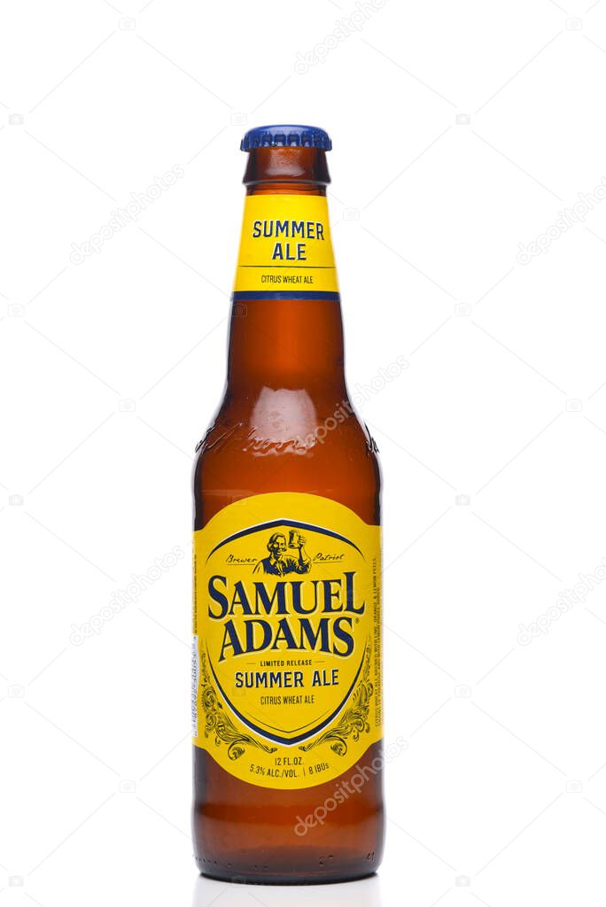 IRVINE, CALIFORNIA - 09 AUG 2020: A bottle of Samuel Adams Summer Ale isolated on white with reflection.