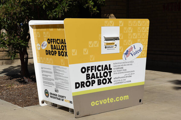 IRVINE, CALIFORNIA - 14 OCT 2020: An Official Ballot Drop Box in in Harvard Park, Irvine, Orange County, California.