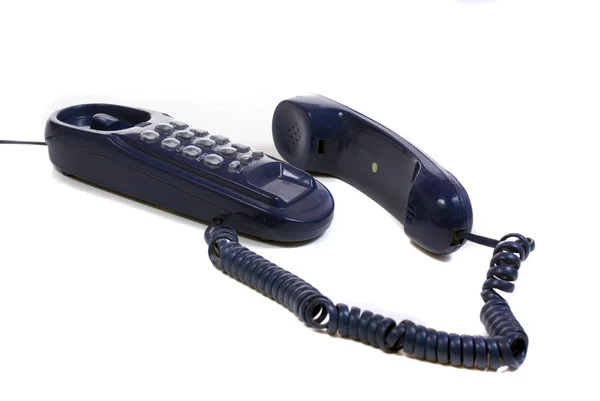 Telefone retro azul com cabo espiral no branco — Fotografia de Stock