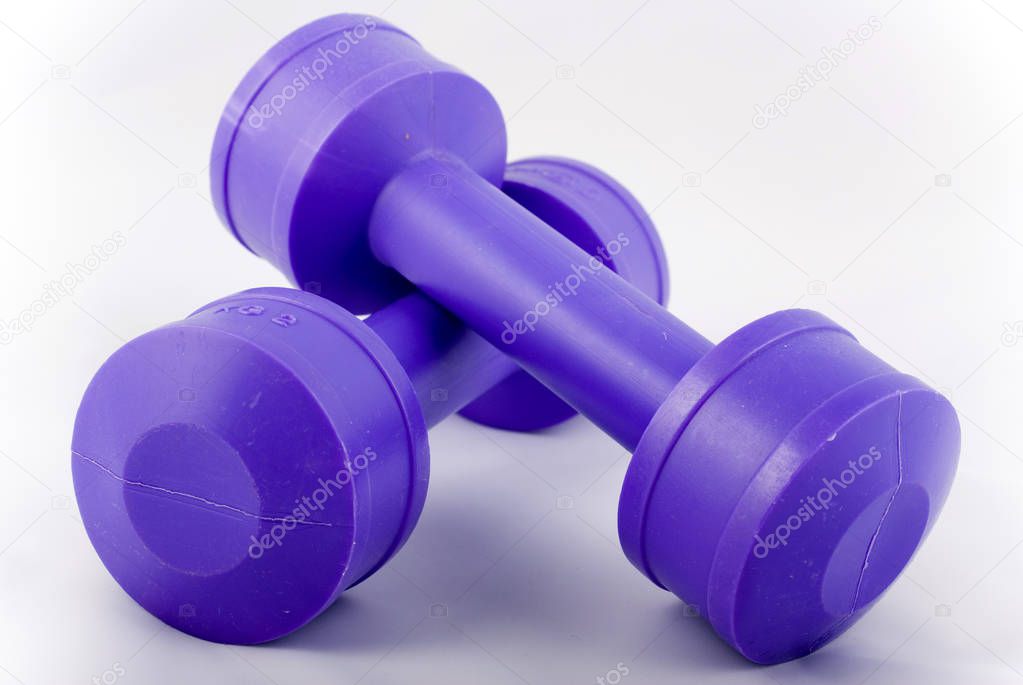 purple dumbbells / weights closeup
