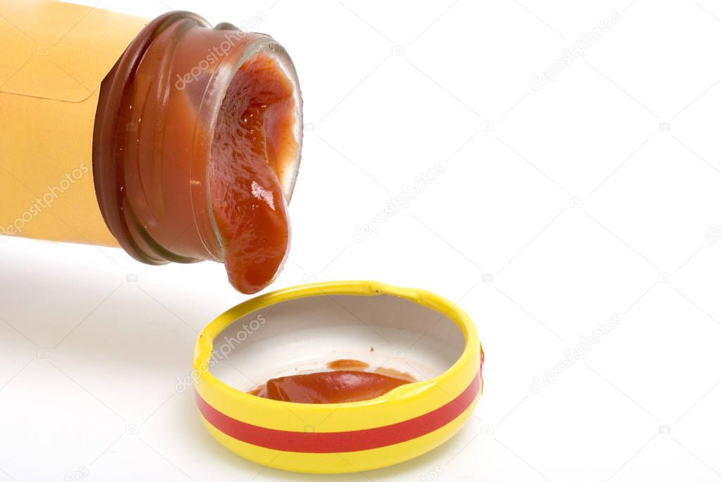 open tomato ketchup bottle and cap