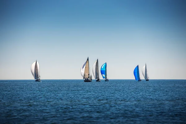 Sailing Regatta in the wind through the waves at the sea — Stock Photo, Image