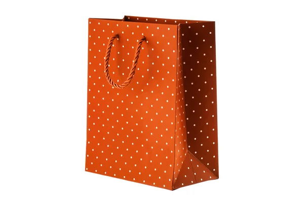 Saco de papel laranja no fundo branco — Fotografia de Stock